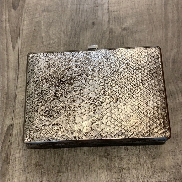 Ivanka Trump Handbags - Silver Snake Clutch